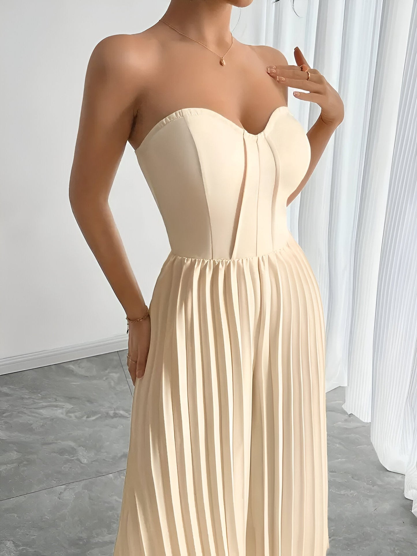 Jumpsuit til kvinder med draperet talje